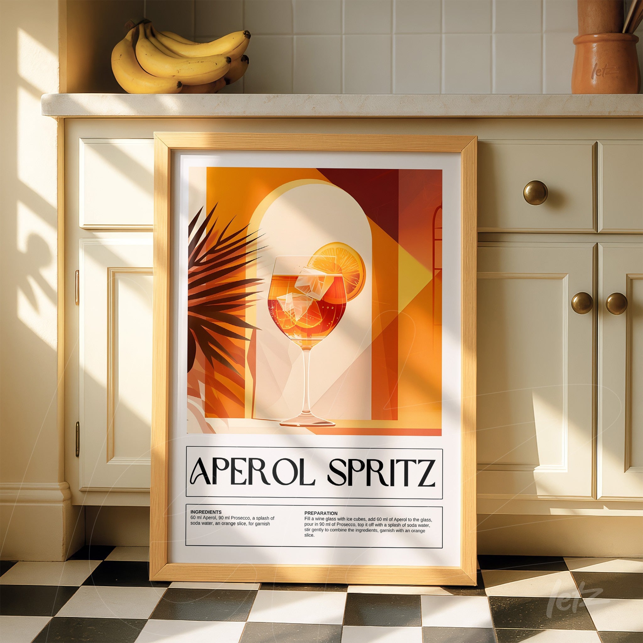 quadro com arte gráfica do drink aperol spritz em moldura clara exibido em cozinha iluminada