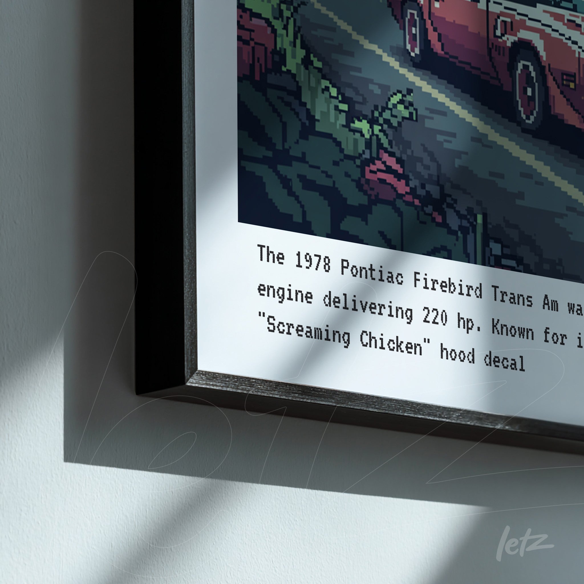 quadro com arte pixelada de um Pontiac Firebird Trans Am de 1978 em moldura preta fina