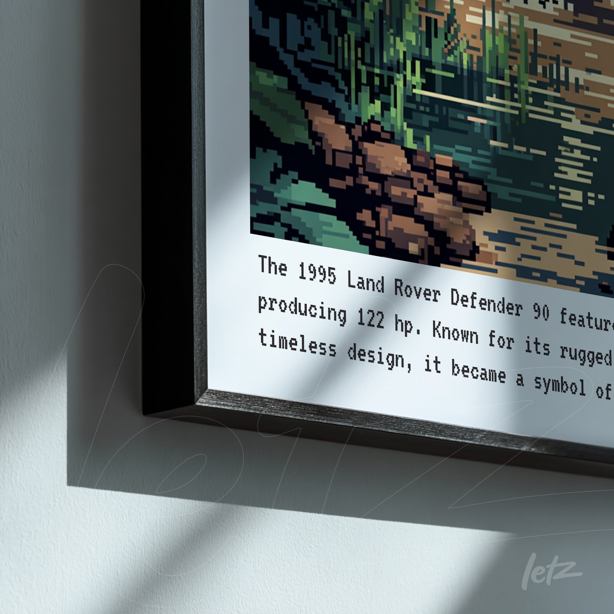 quadro com arte digital em pixels do carro Land Rover Defender 1995 em moldura preta, com fundo de natureza