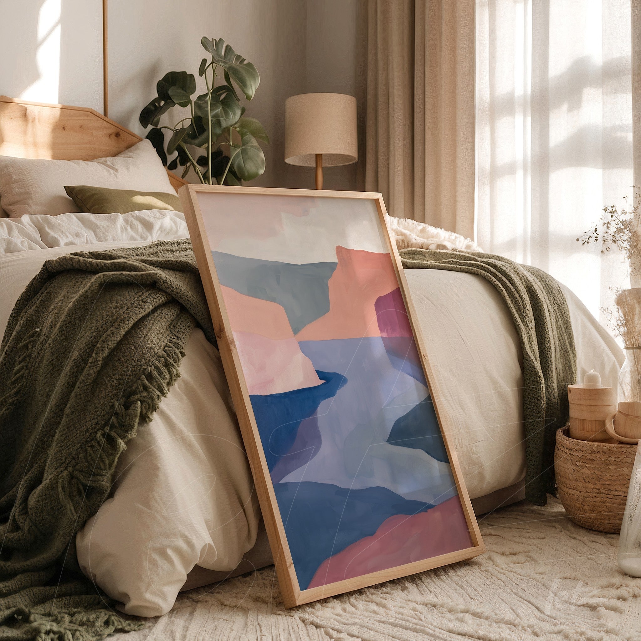 quadro em estilo contemporâneo com paisagem abstrata em tons de rosa, azul e bege, apoiado ao lado de uma cama em um quarto aconchegante