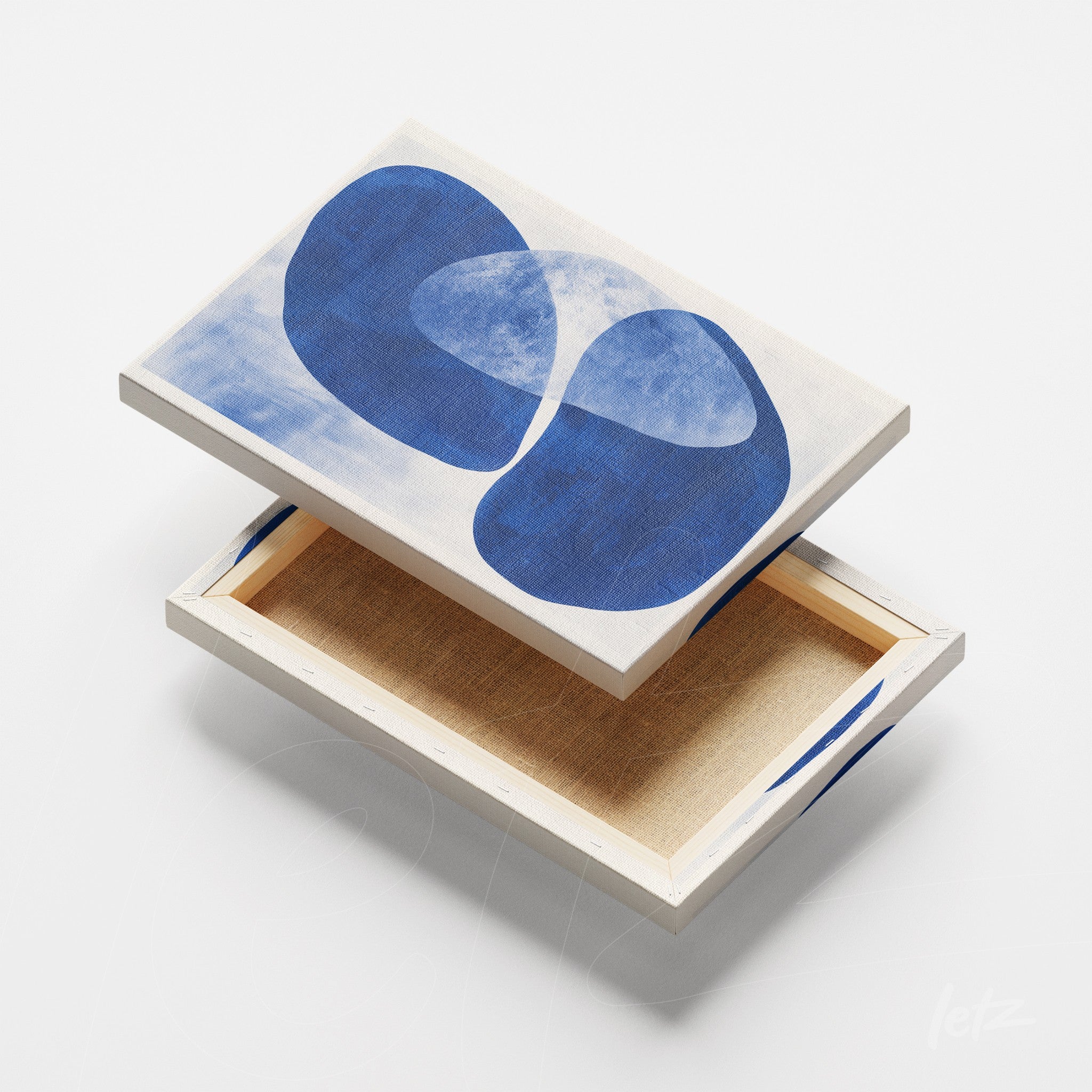 quadro em canvas com formas abstratas em tons de azul sobre fundo claro