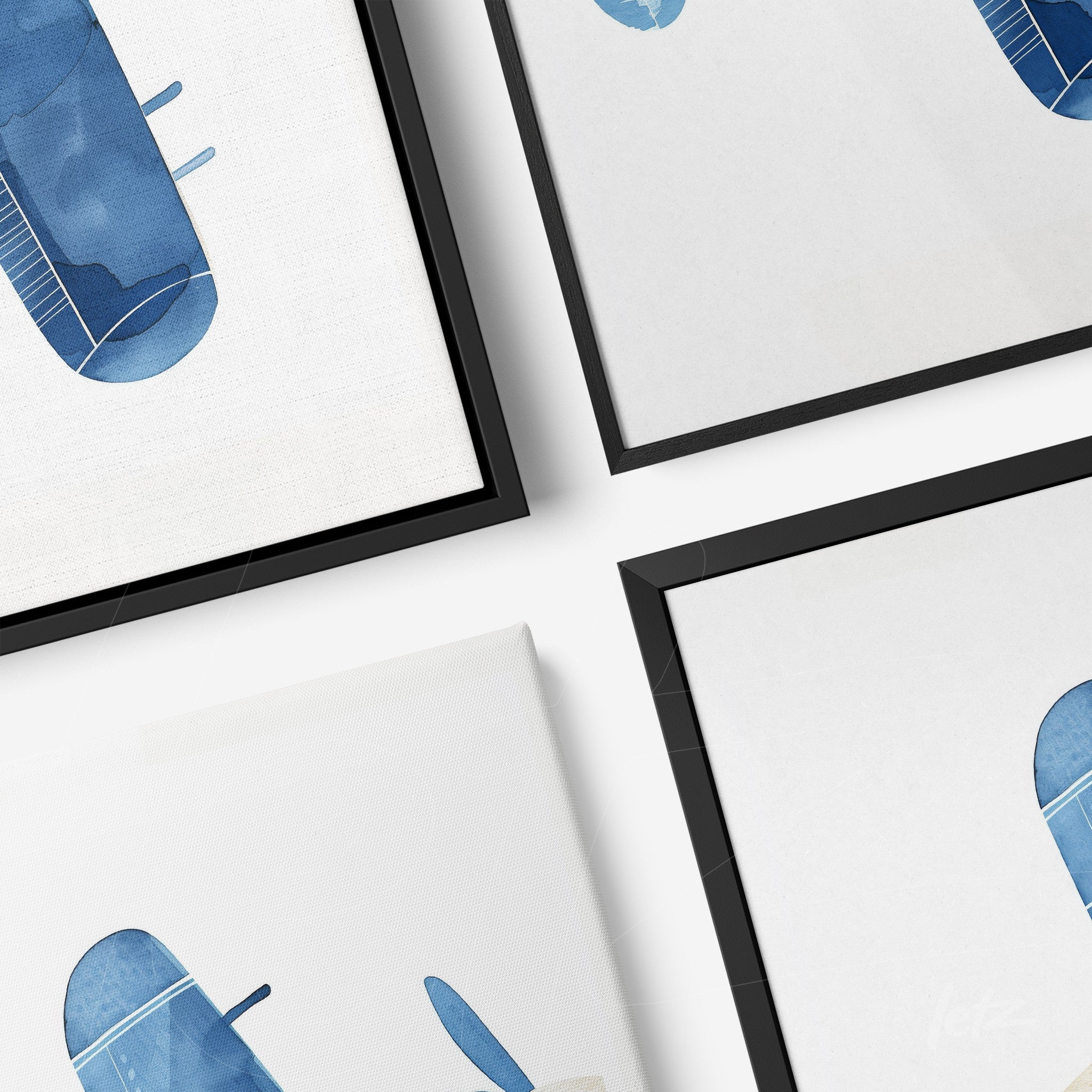 composição com quadros em diferentes molduras, apresentando ilustrações abstratas em tons de azul em fundo claro