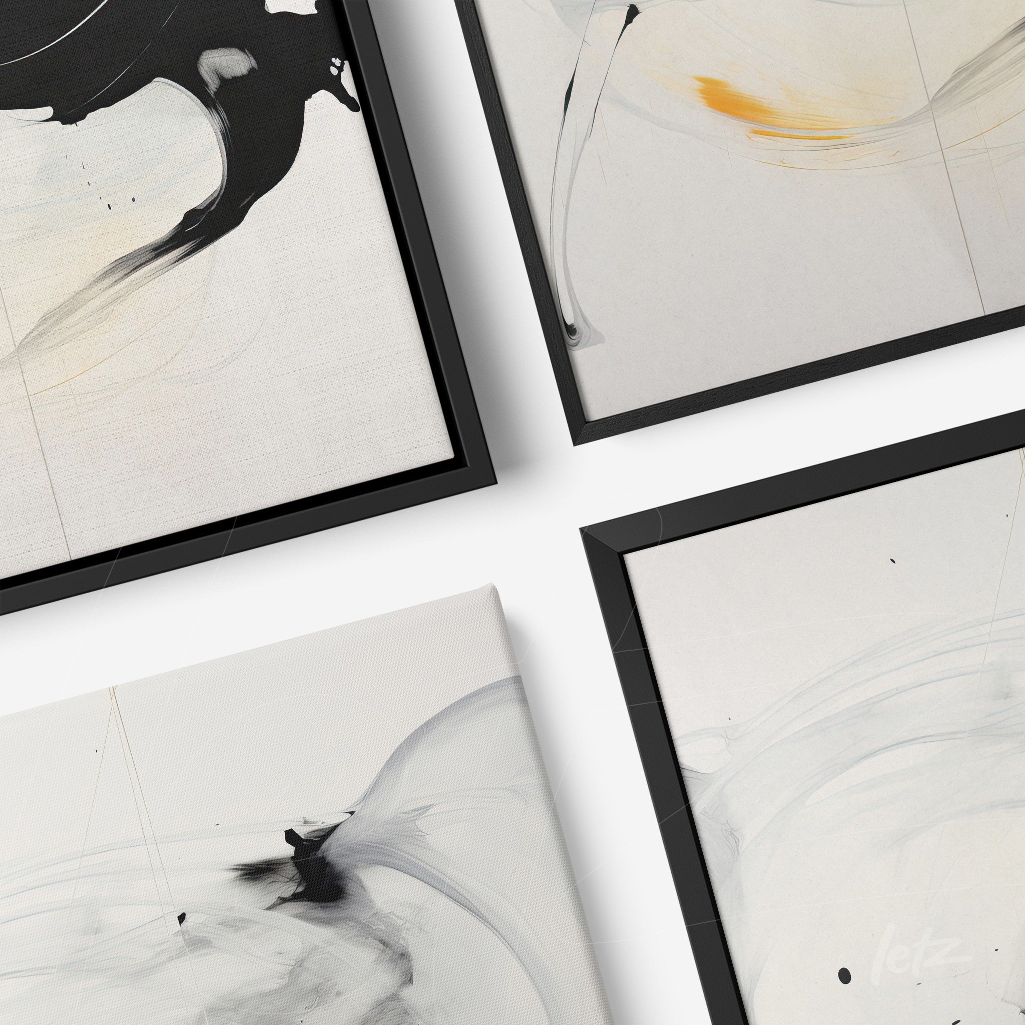 composição de quadros em moldura preta com arte abstrata em branco e preto