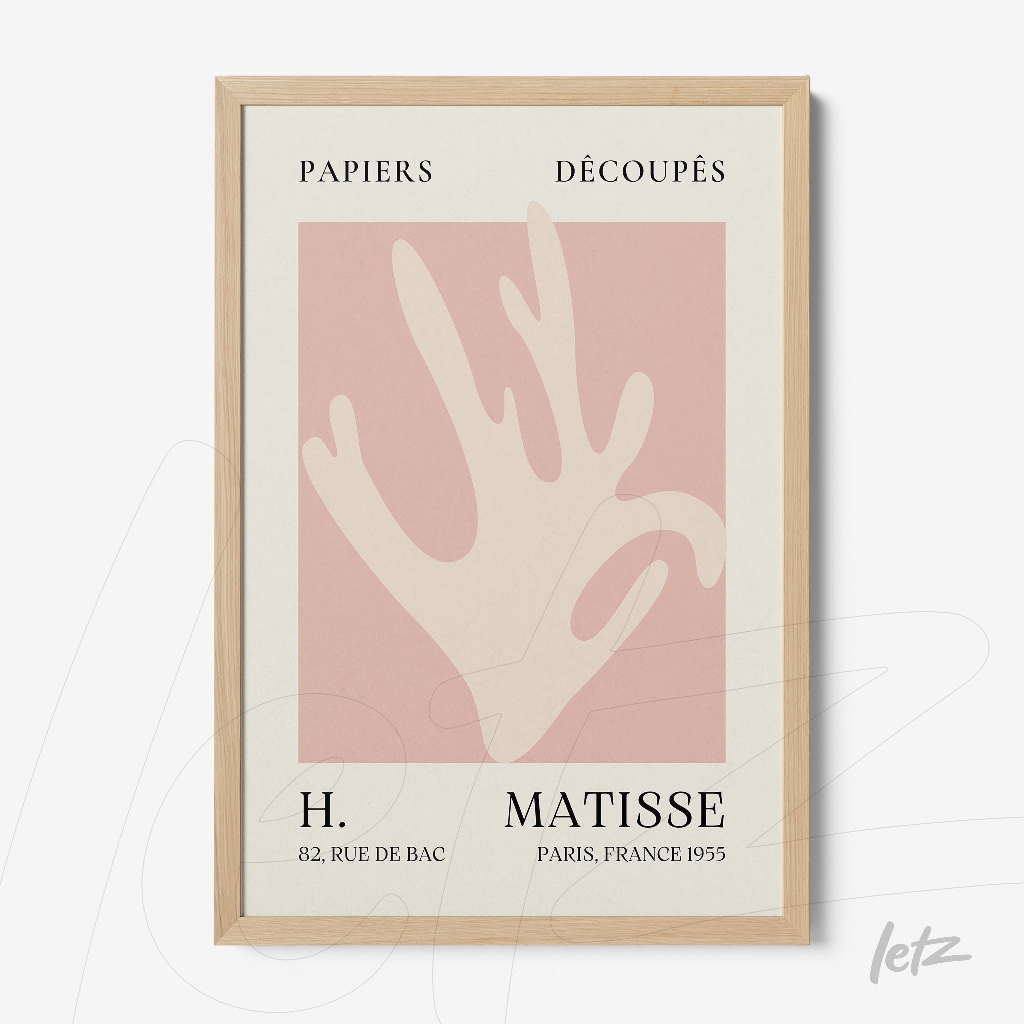 quadro com arte moderna de uma mão estilizada em fundo rosa e moldura clara