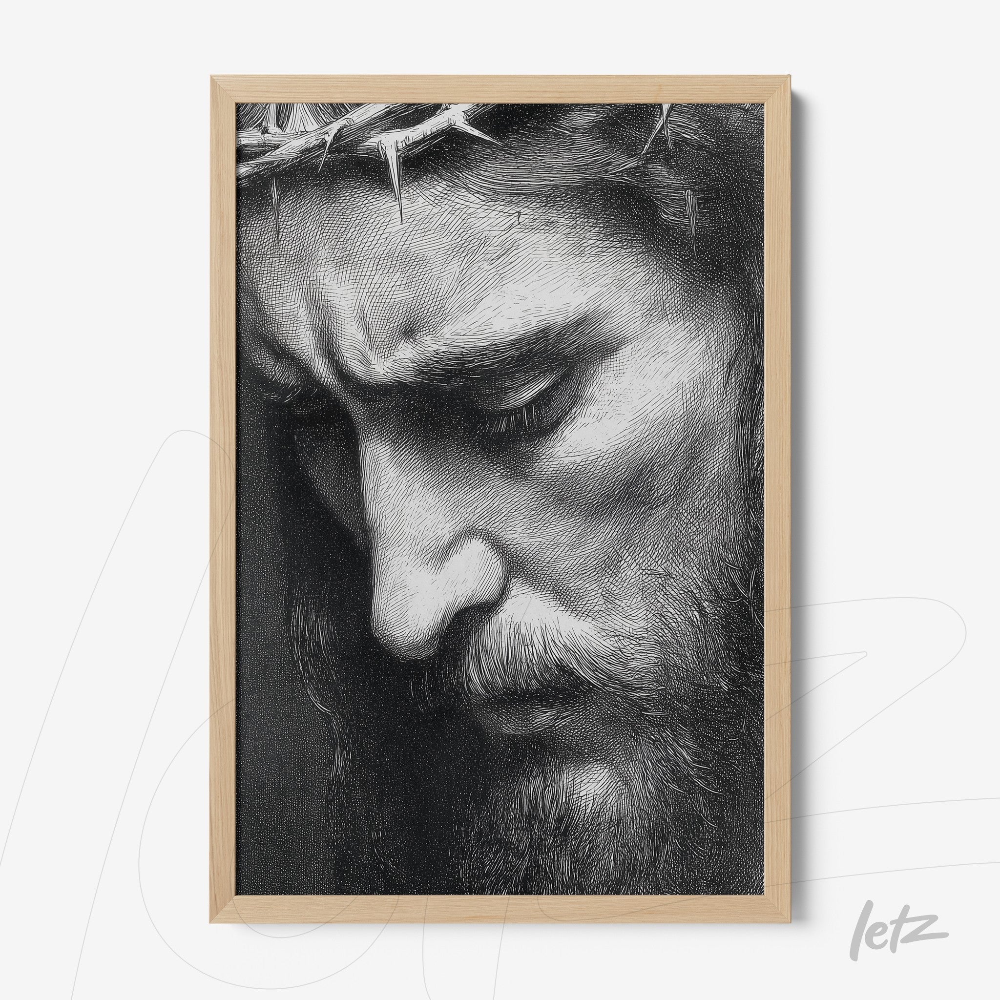 quadro com arte religiosa em preto e branco retratando o rosto de Jesus com expressão de tristeza, moldura de madeira clara
