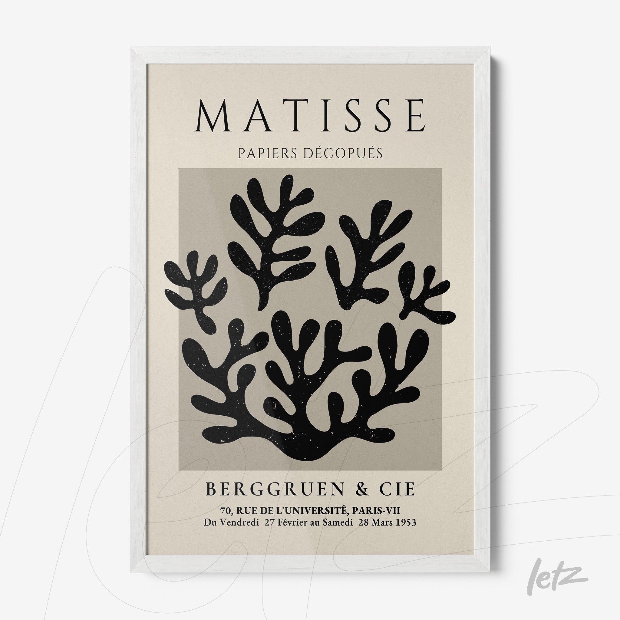 quadro com arte moderna de folhagens em recortes, emoldurado com moldura branca