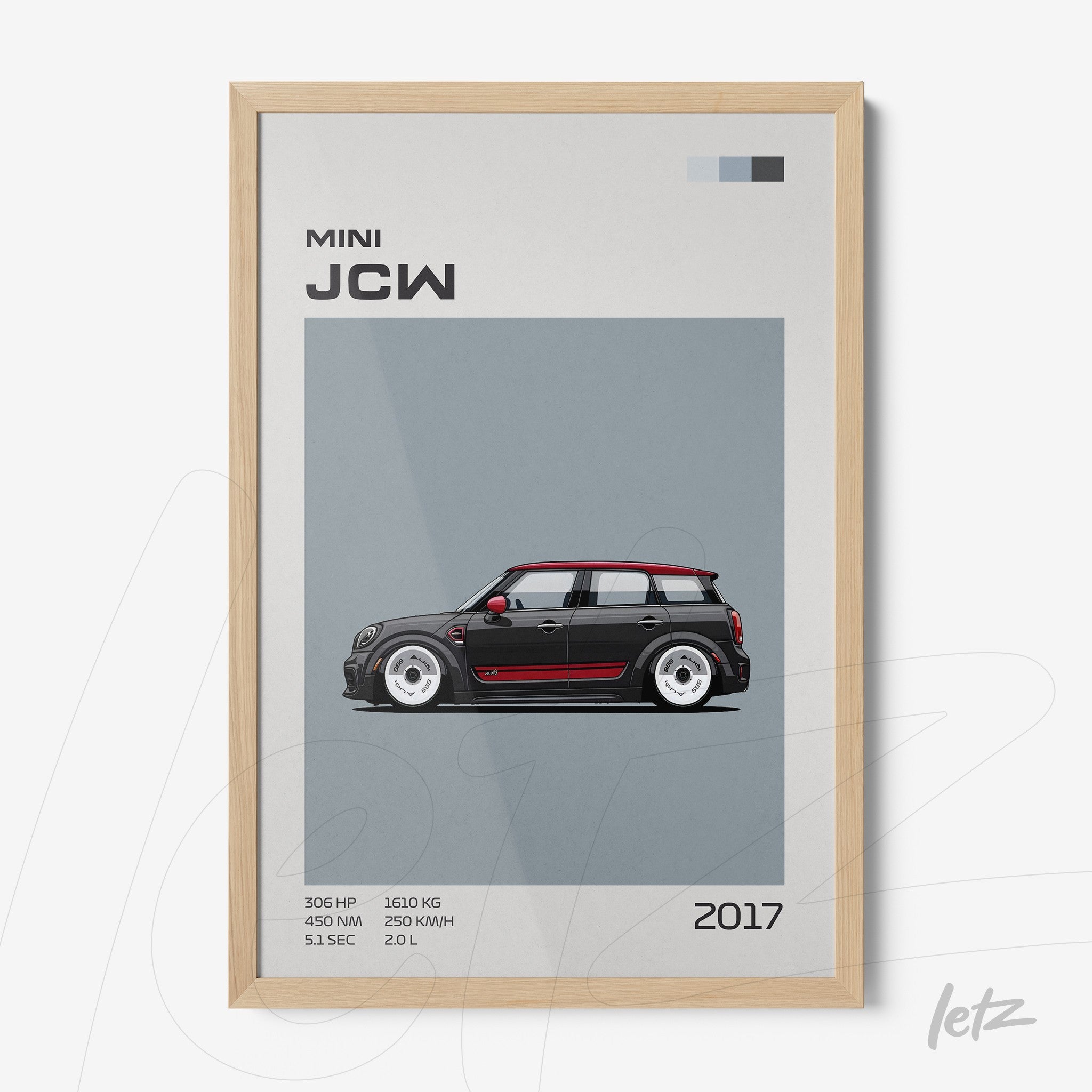 quadro com arte do carro Mini JCW de 2017, exibido em moldura de madeira clara com fundo cinza e detalhes gráficos