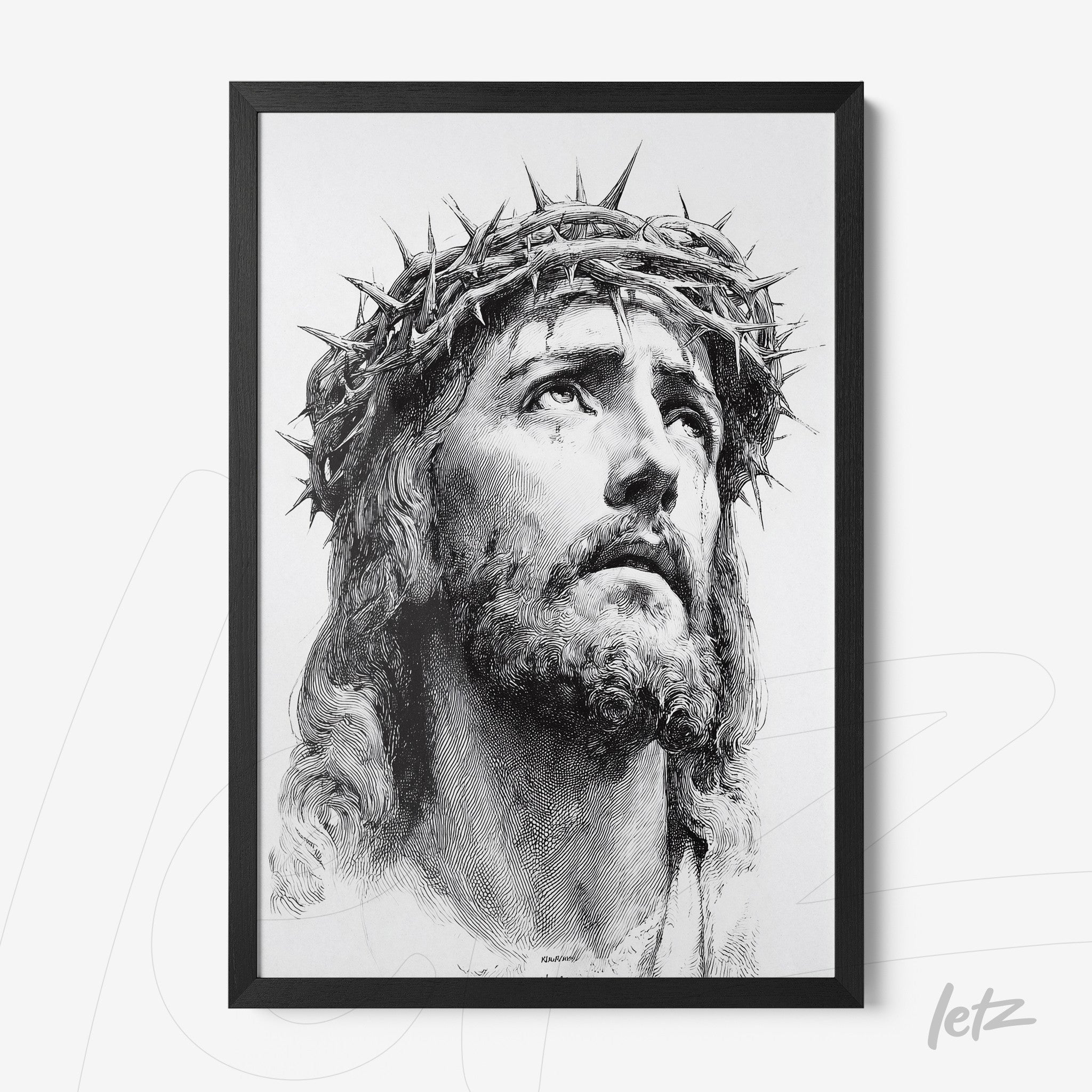quadro em preto e branco com retrato de Jesus Cristo usando coroa de espinhos em moldura preta