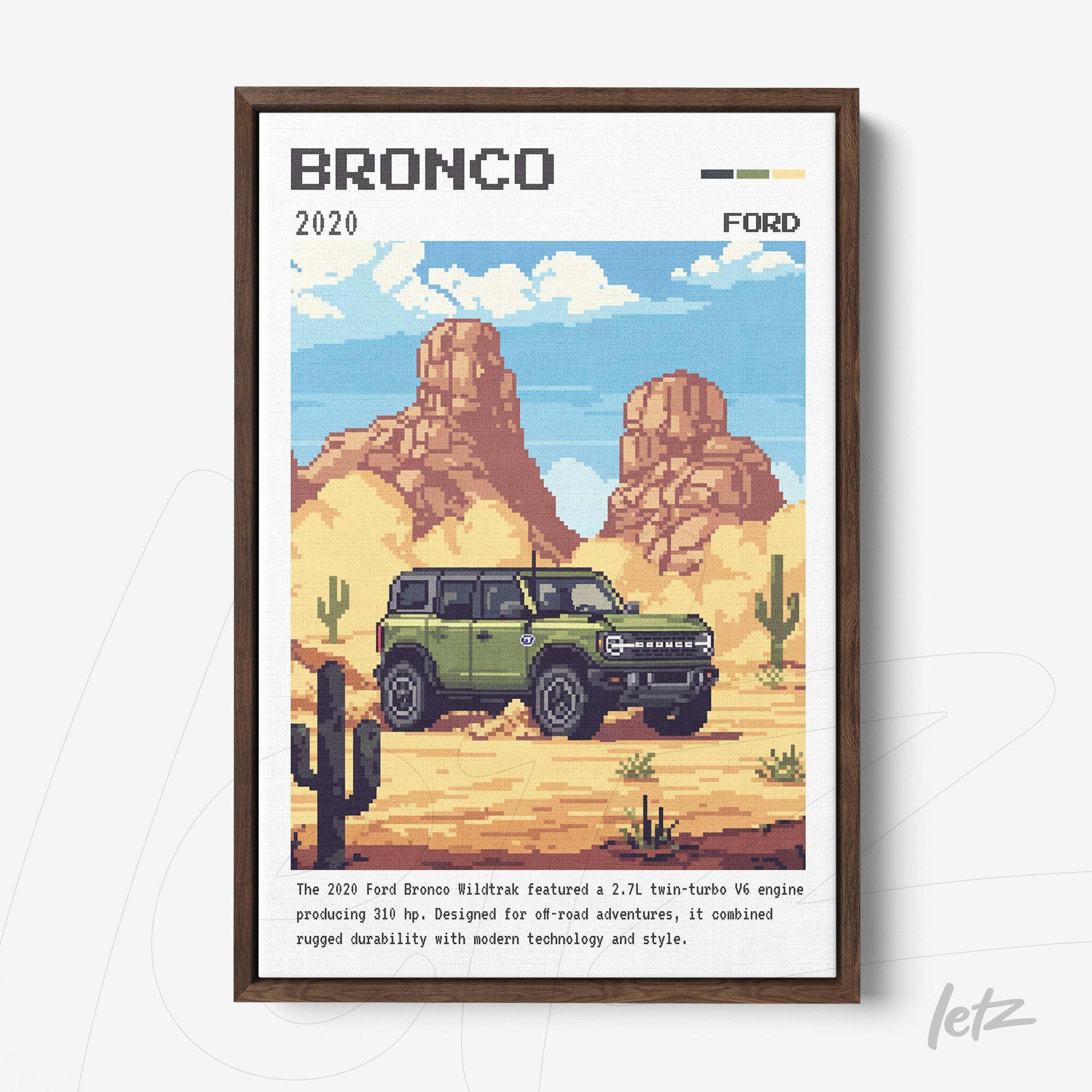 quadro com arte digital em estilo pixelado do Ford Bronco 2020 estacionado em um cenário desértico com cactos e montanhas ao fundo, moldura marrom escura