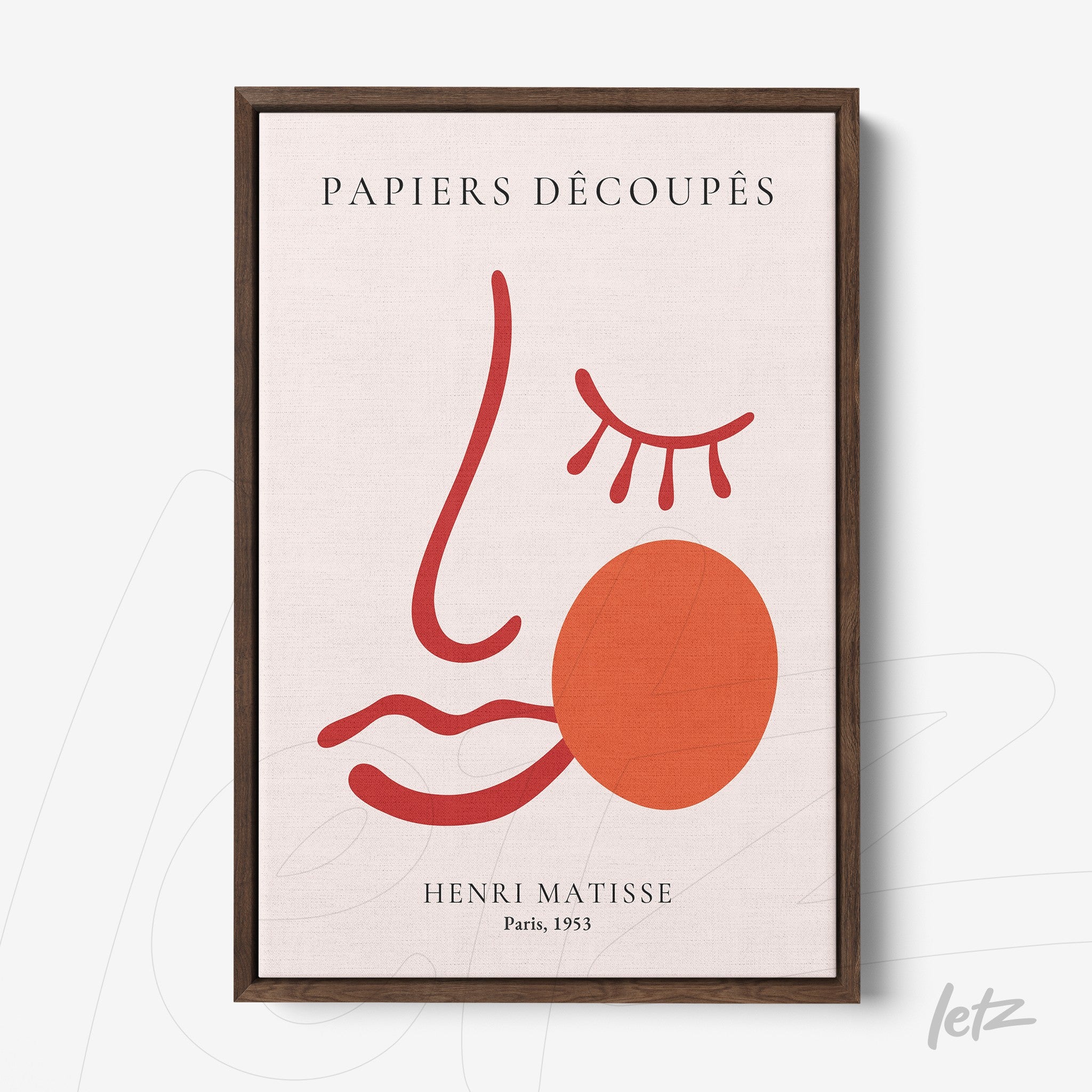 quadro com arte abstrata de rosto em vermelho e terracota, escrito PAPIERS DÉCOUPÉS, moldura de madeira escura