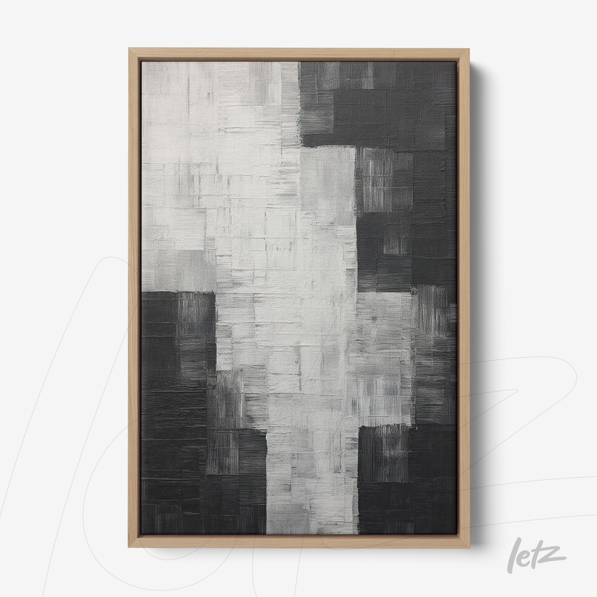 quadro em canvas com arte abstrata em tons de preto, branco e cinza com moldura de madeira clara