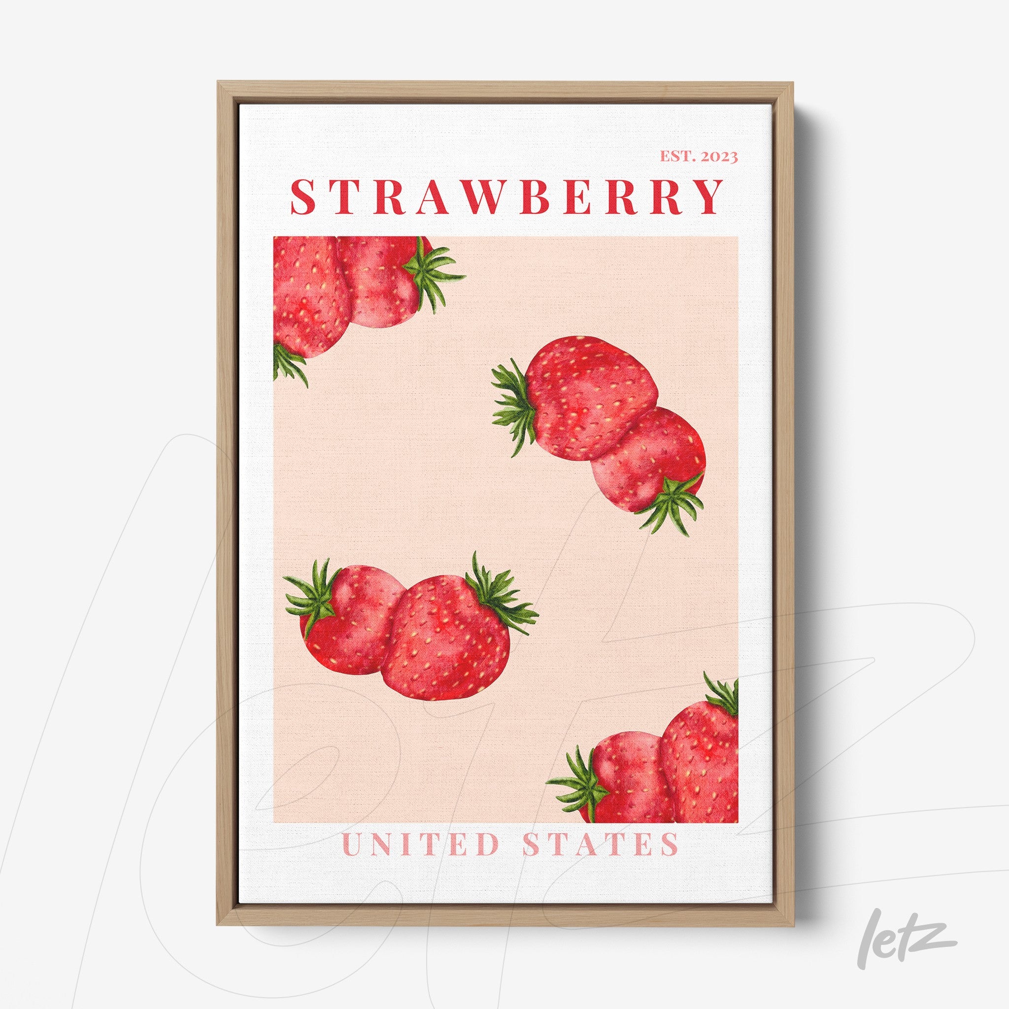 quadro com ilustração de morangos vermelhos sobre fundo rosa claro em moldura de madeira clara