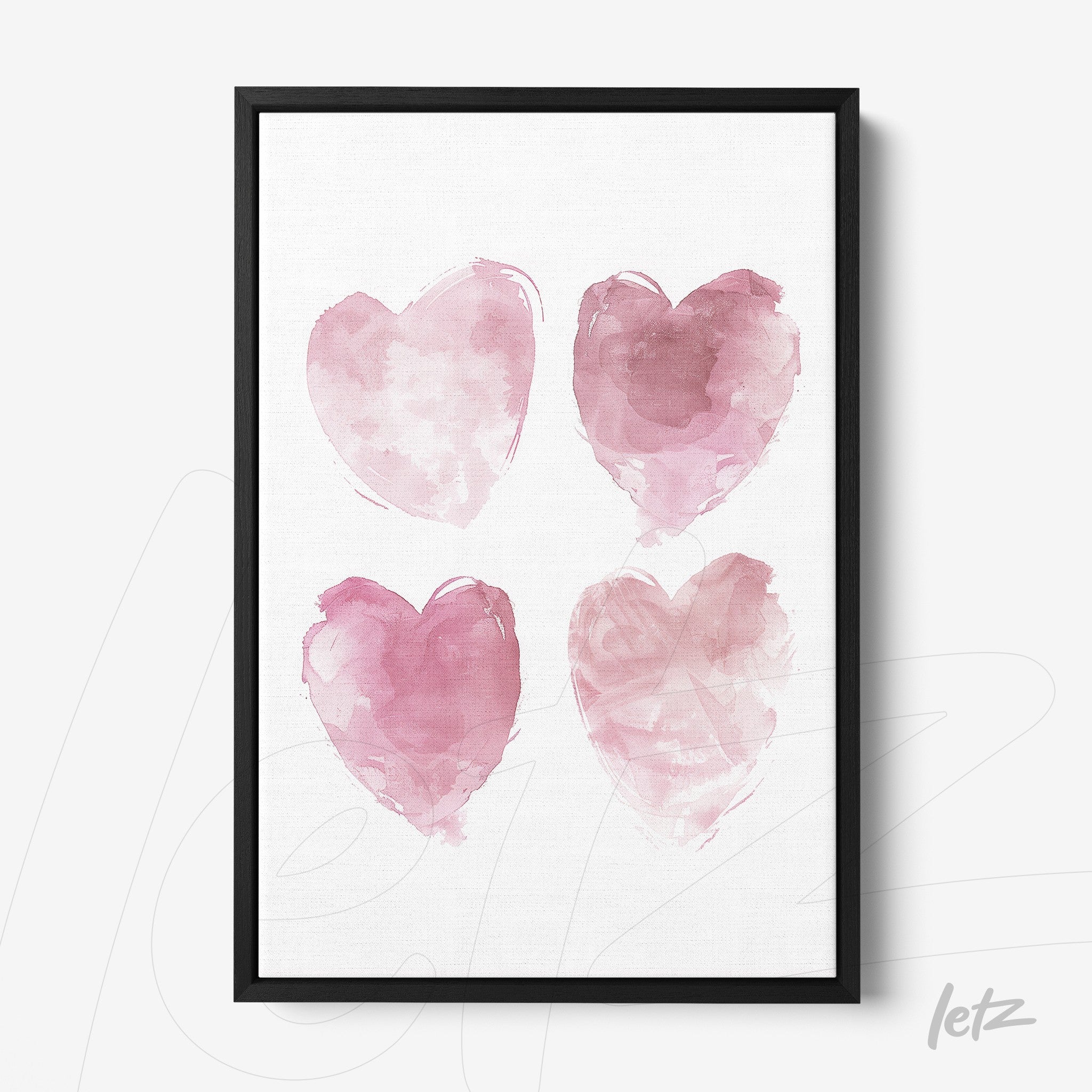 quadro com arte em aquarela de quatro corações rosa em moldura preta