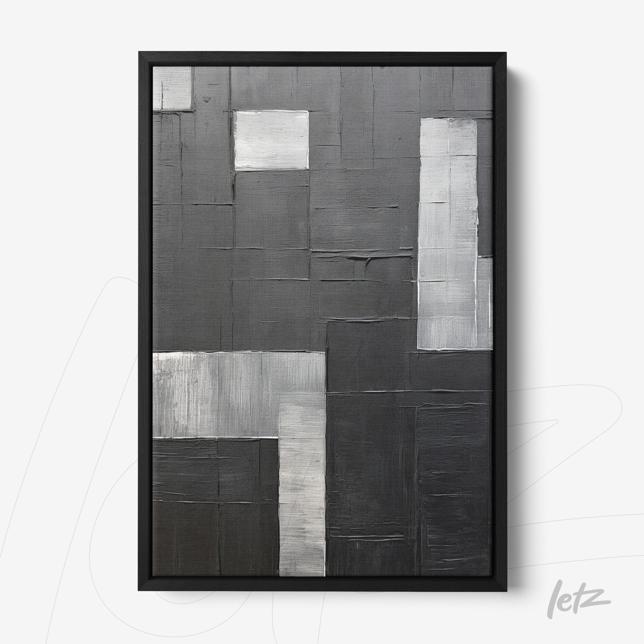 quadro abstrato com texturas em tons de preto e cinza, moldura preta