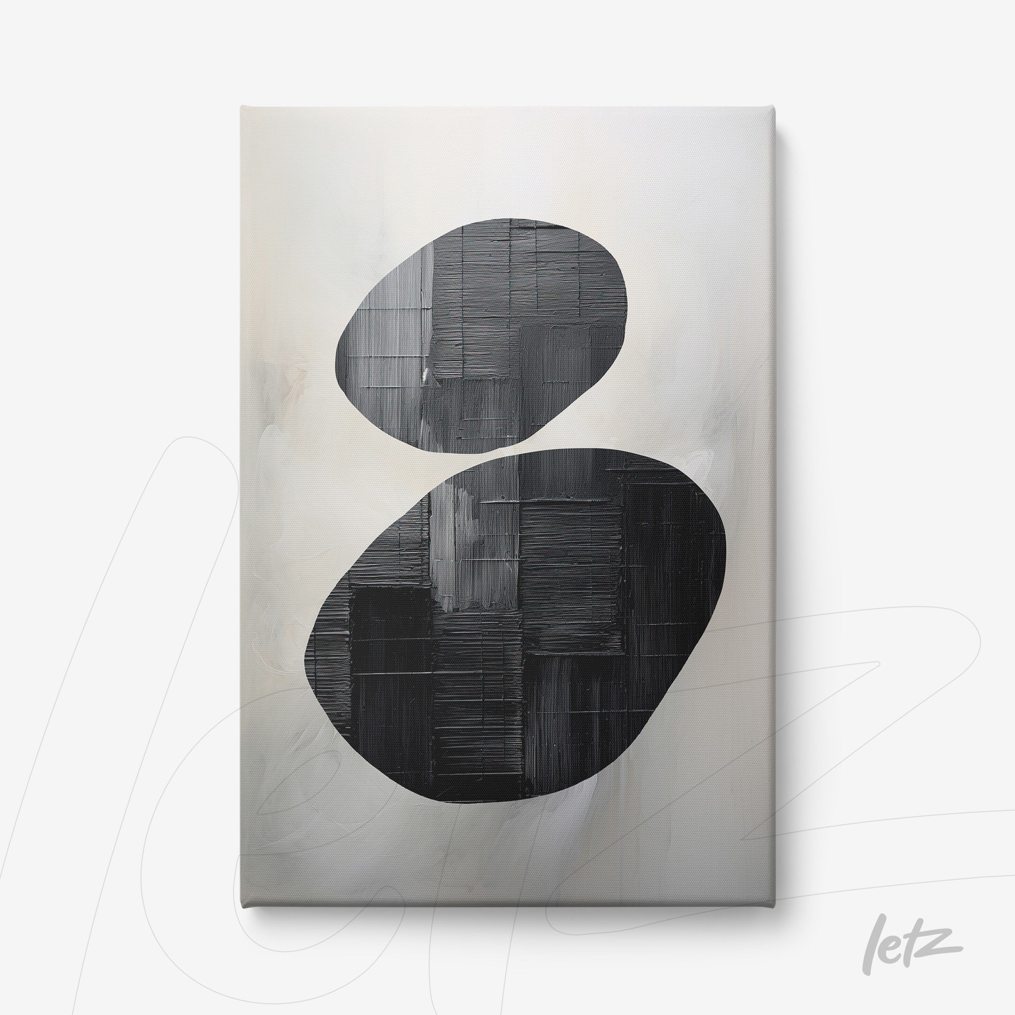 quadro em canvas com formas abstratas pretas sobre fundo suave e claro