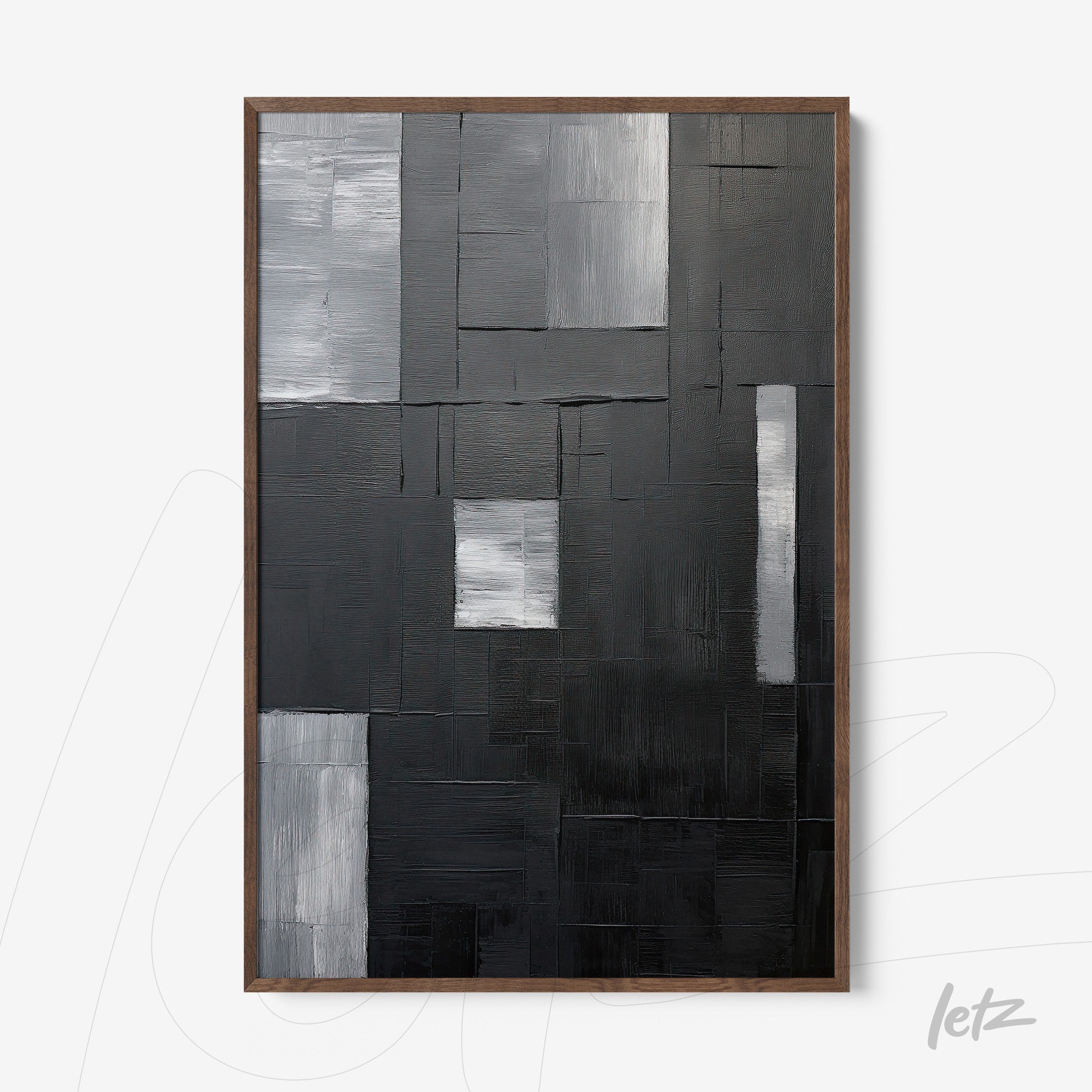 quadro em relevo com arte abstrata em tons de preto, cinza e prata, moldura de madeira escura