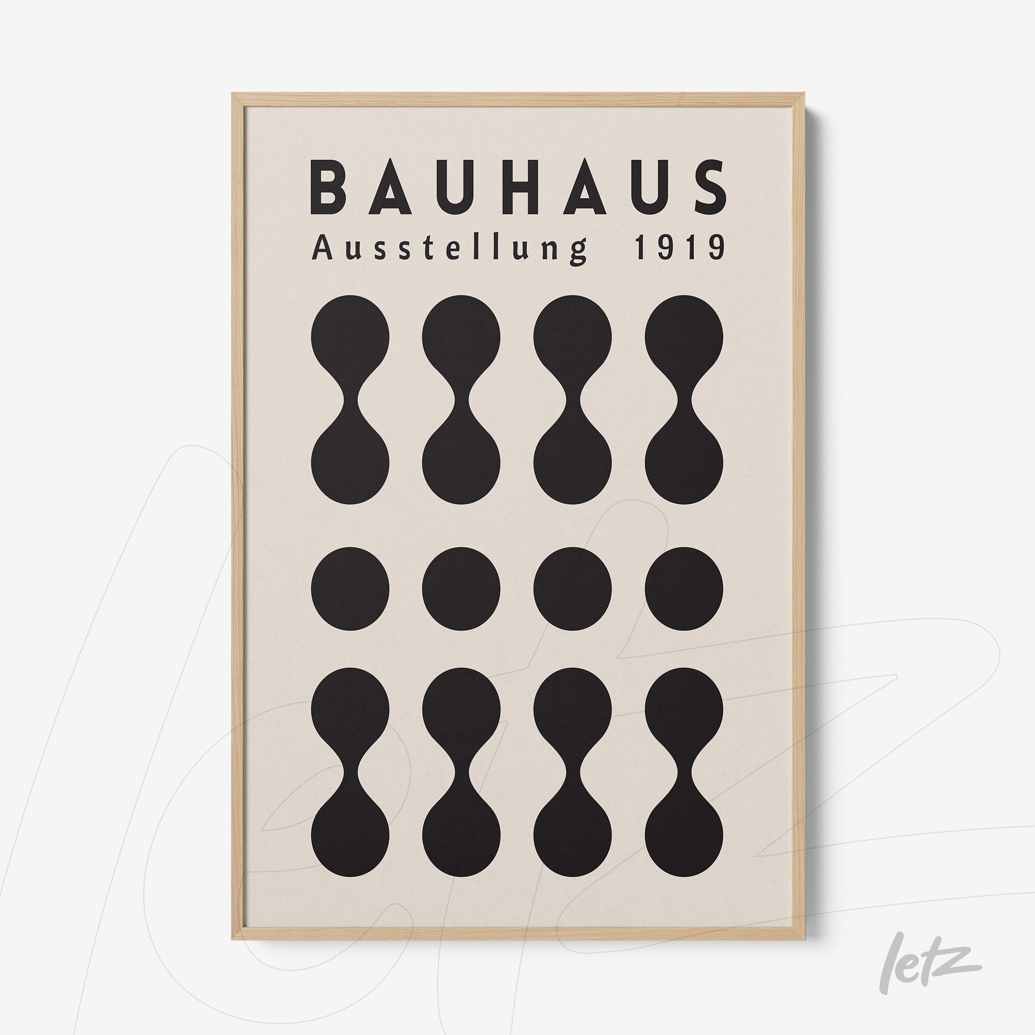 quadro com design geométrico estilizado do bauhaus em moldura de madeira clara