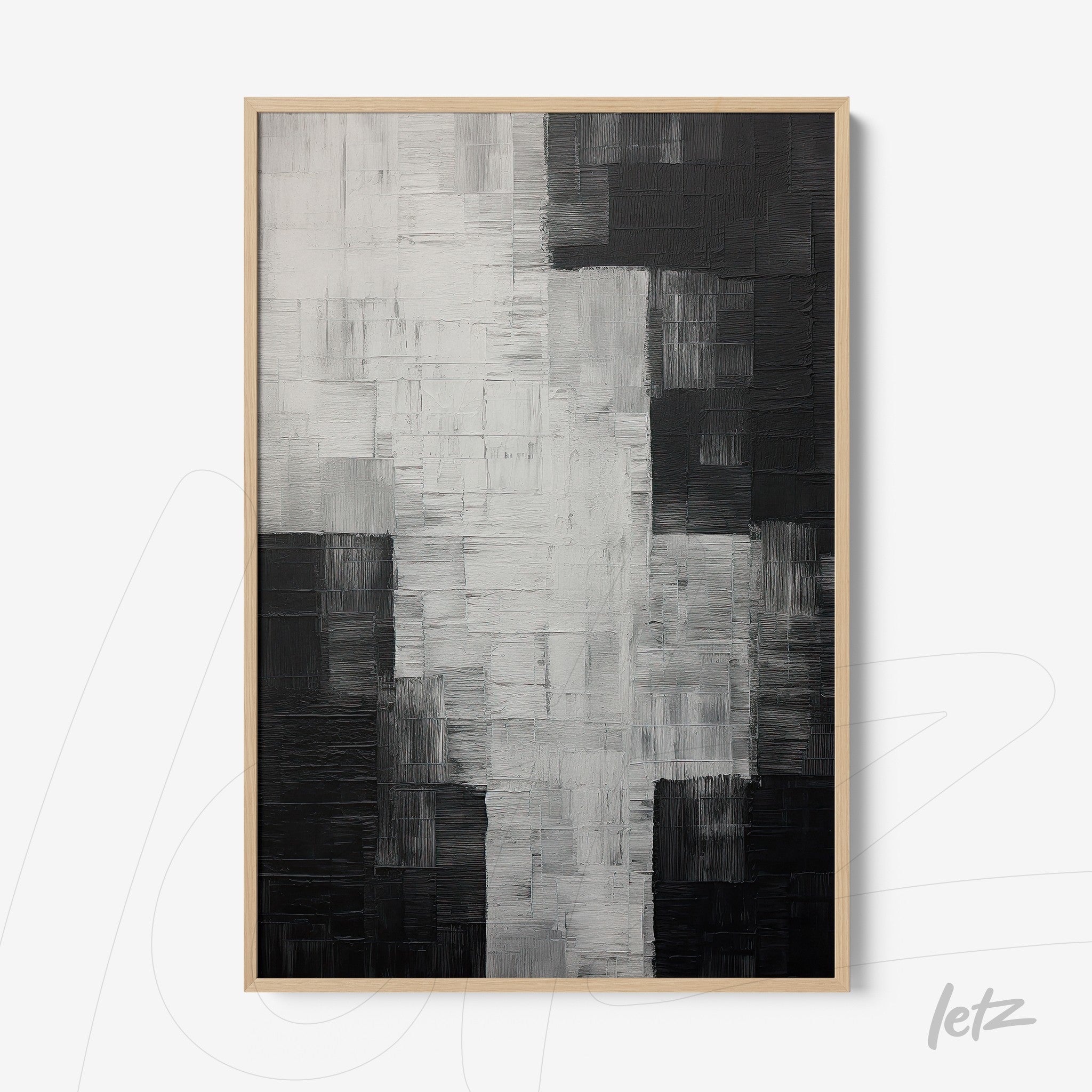 quadro abstrato em preto e branco com texturas em relevo em moldura de madeira clara