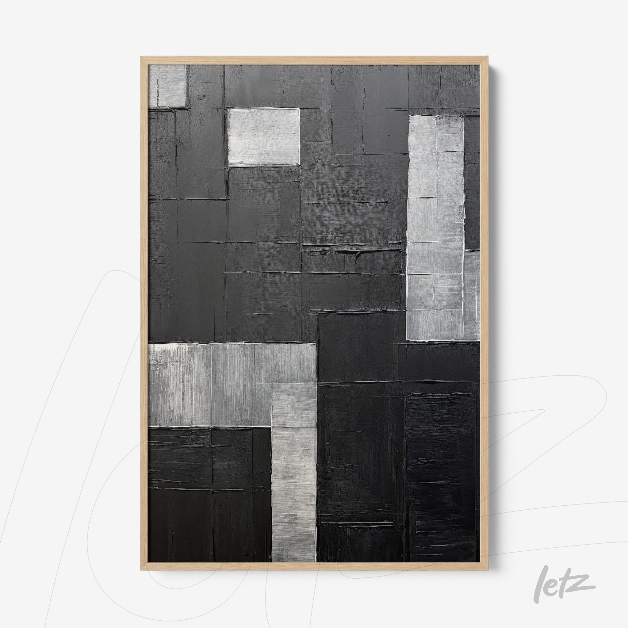 quadro abstrato com composição geométrica em tons de preto, cinza e branco, moldura de madeira clara