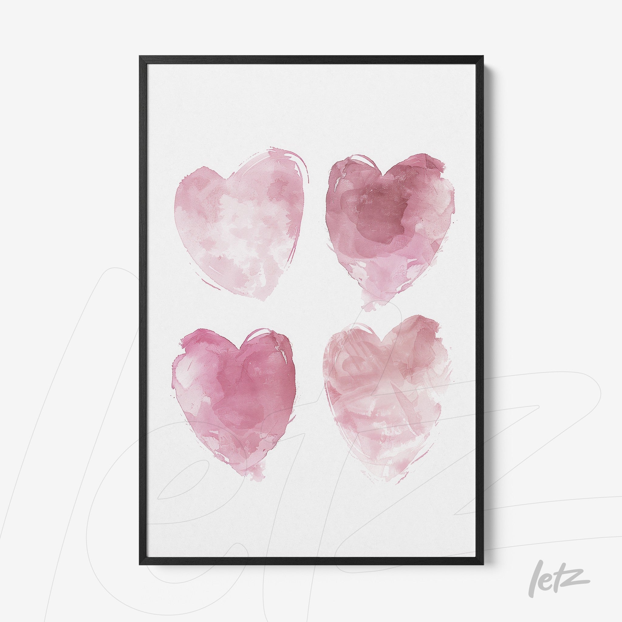 quadro com quatro corações aquarelados em tons de rosa, moldura preta