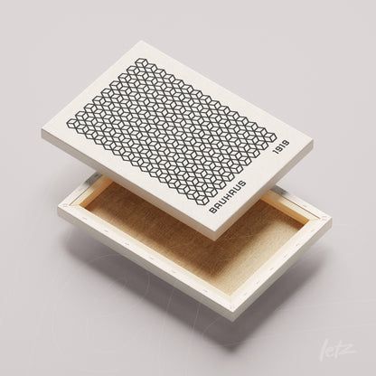 caixa decorativa estilo bauhaus com padrão geométrico em preto e branco e data 1919