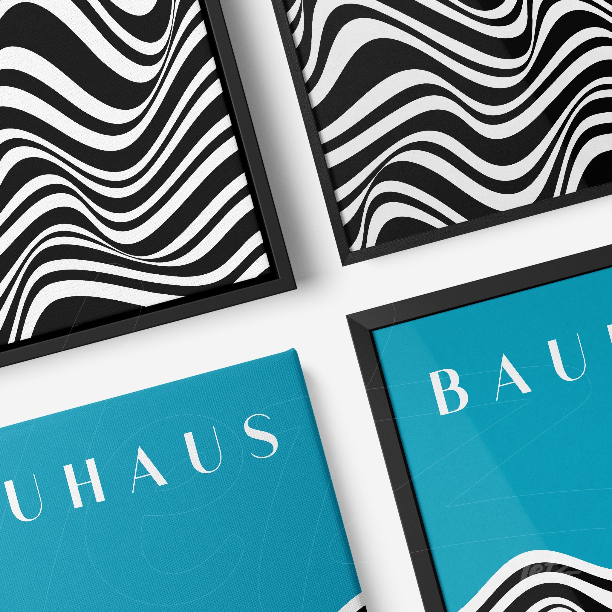 composição de quatro quadros com arte geométrica abstrata em molduras pretas sobre parede branca