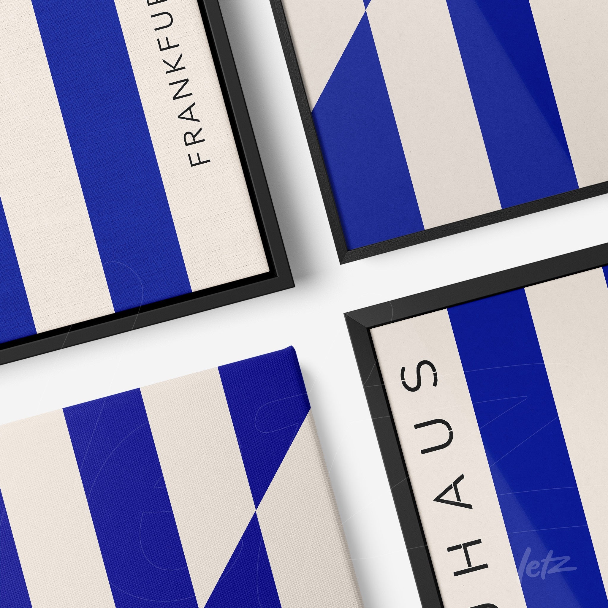 quadro decorativo com design geométrico em azul e bege, apresentando moldura preta