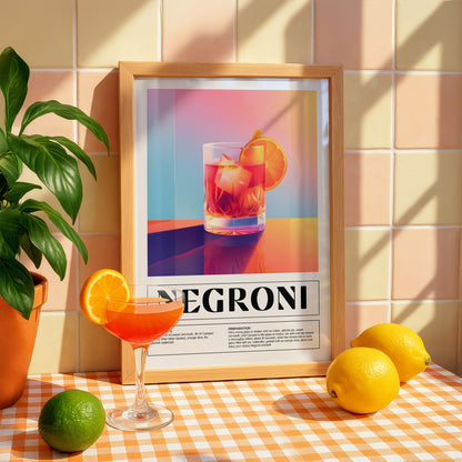 quadro decorativo com arte gráfica de drink negroni em moldura de madeira clara, rodeado por frutas cítricas e planta verde