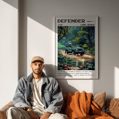 quadro emoldurado com arte pixelada do Land Rover Defender, exibido sobre sofá marrom com manta laranja