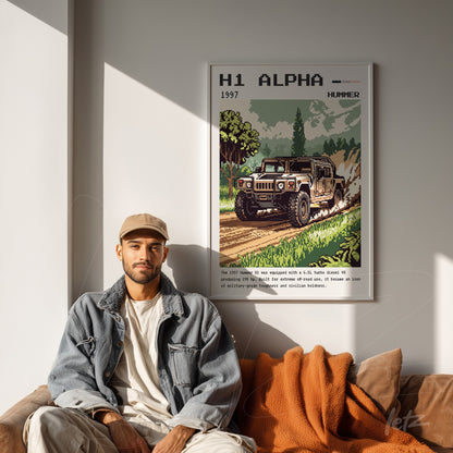 quadro com arte pixelada do Hummer H1 Alpha em moldura branca sobre parede clara, com homem sentado ao lado em sofá acolchoado
