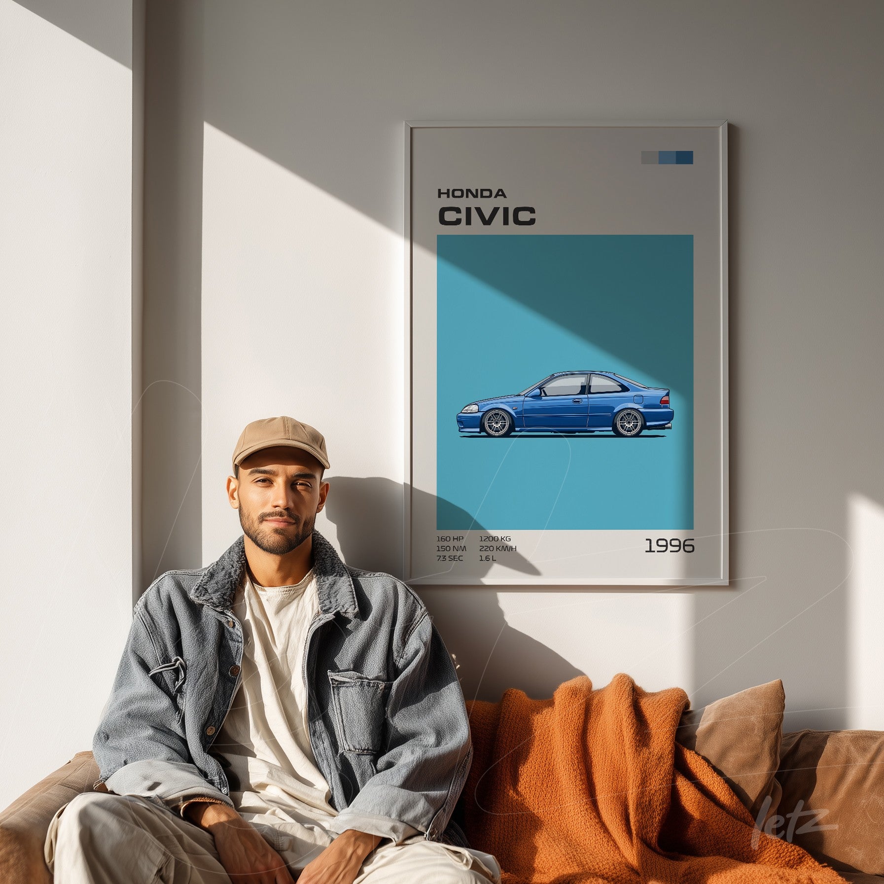 quadro com arte digital do Honda Civic 1996 em moldura branca, apresentado acima de um sofá com cobertor laranja