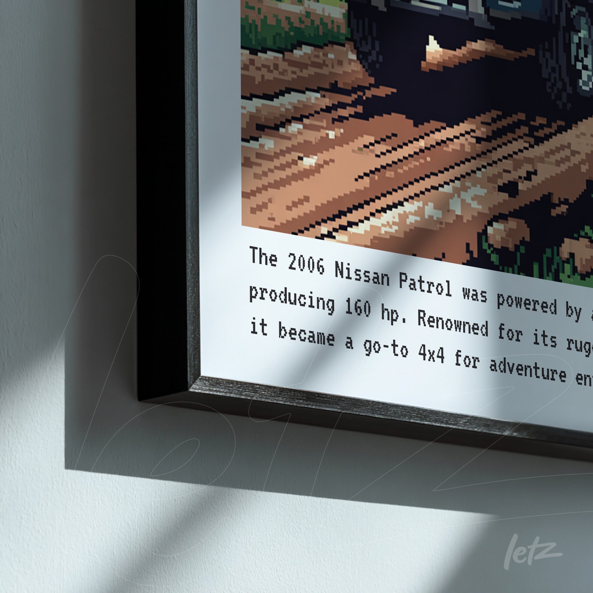 quadro com arte pixelada do carro Nissan Patrol em moldura preta fina, com texto informativo sobre suas características