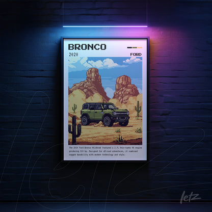 quadro emoldurado com arte pixelada do veículo Ford Bronco em um deserto montanhoso, destacando cores vibrantes e detalhes de vegetação