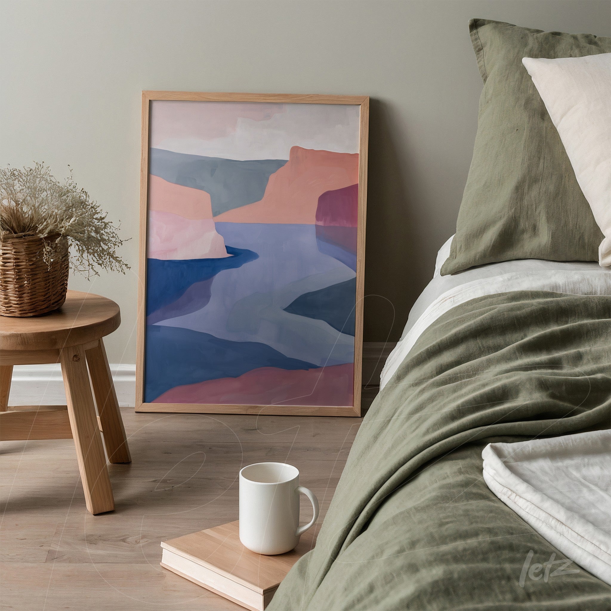 quadro com arte abstrata de paisagem em moldura clara exibido ao lado de cama em ambiente minimalista