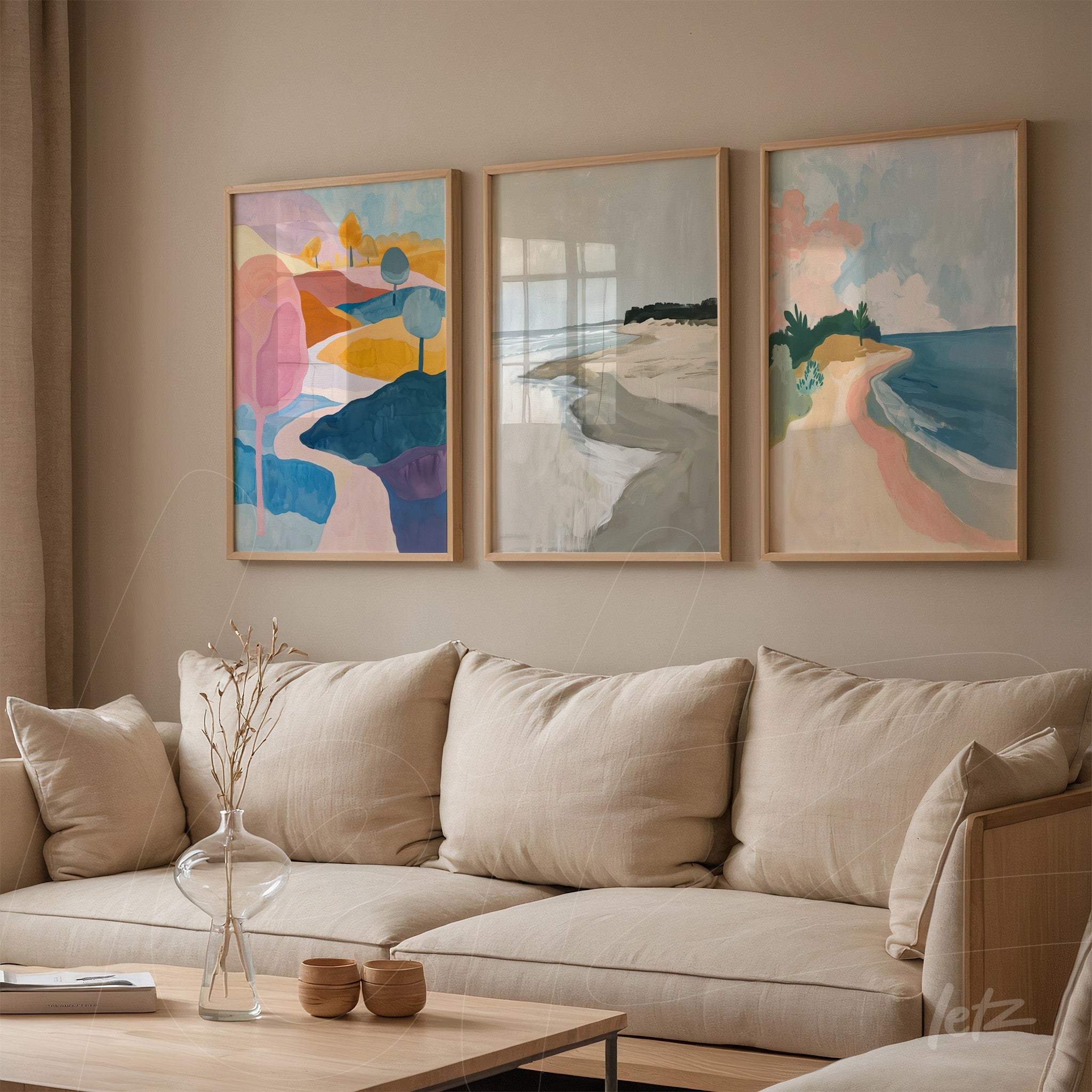 série de quadros com paisagens abstratas em molduras de madeira clara sobre parede neutra