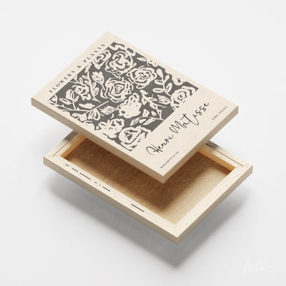 quadro em canvas com ilustração de flores em estilo artístico preto e branco e moldura clara