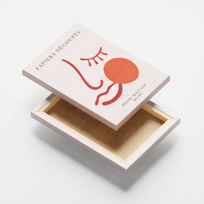 caixa com design minimalista de arte abstrata, apresentando linhas estilizadas em vermelho e uma forma circular, com fundo em tom claro