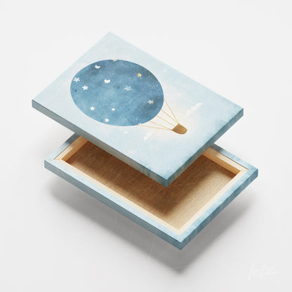 quadro em canvas com ilustração de balão de ar quente azul sobre fundo claro