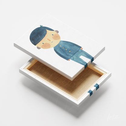 quadro em canvas com ilustração de menino com cabelo azul e roupa azul, exibido em uma caixa aberta