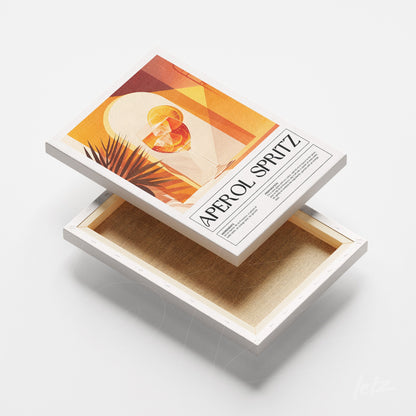 quadro em canvas com arte de drink Aperol Spritz, moldura branca e fundo laranja