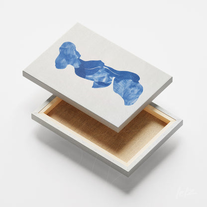 quadro em canvas com arte abstrata em tons de azul sobre fundo claro