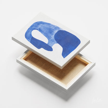 quadro em canvas com arte abstrata em tons de azul sobre fundo claro