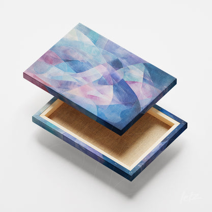 quadro em canvas com arte abstrata em tons de azul e rosa, apresentando formas geométricas suaves
