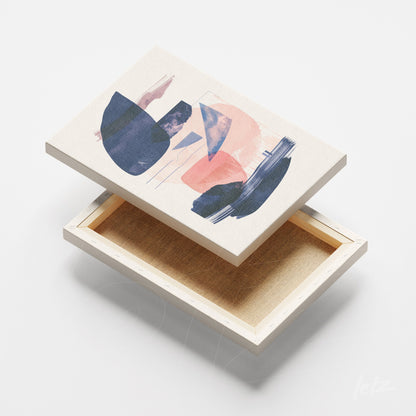 quadro em tela canvas com arte abstrata em tons azuis e pêssego, sobre fundo claro