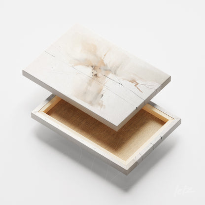 quadro em canvas com arte abstrata em tons neutros e detalhes em dourado, moldura fina branca