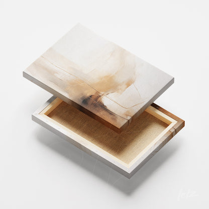 detalhe de quadro em canvas com arte abstrata em tons de bege e marrom