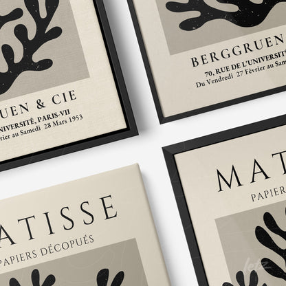 composição de quadros decorativos com arte abstrata em molduras pretas, apresentando corais e referências a Matisse