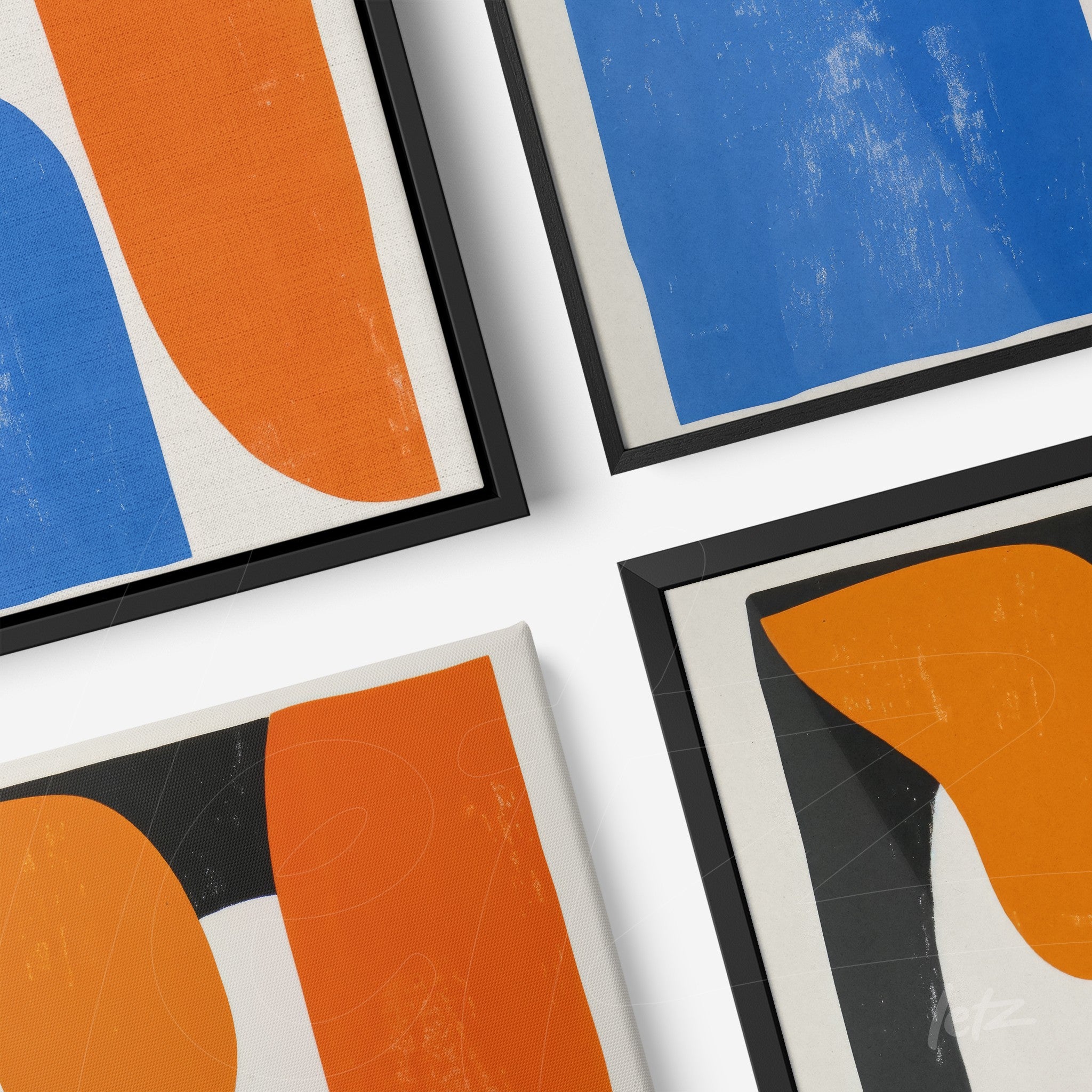 composição de quadros com formas abstratas em azul, laranja e preto, molduras pretas