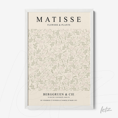 quadro decorativo com padrão floral em tons suaves, moldura branca e texto com o nome Matisse