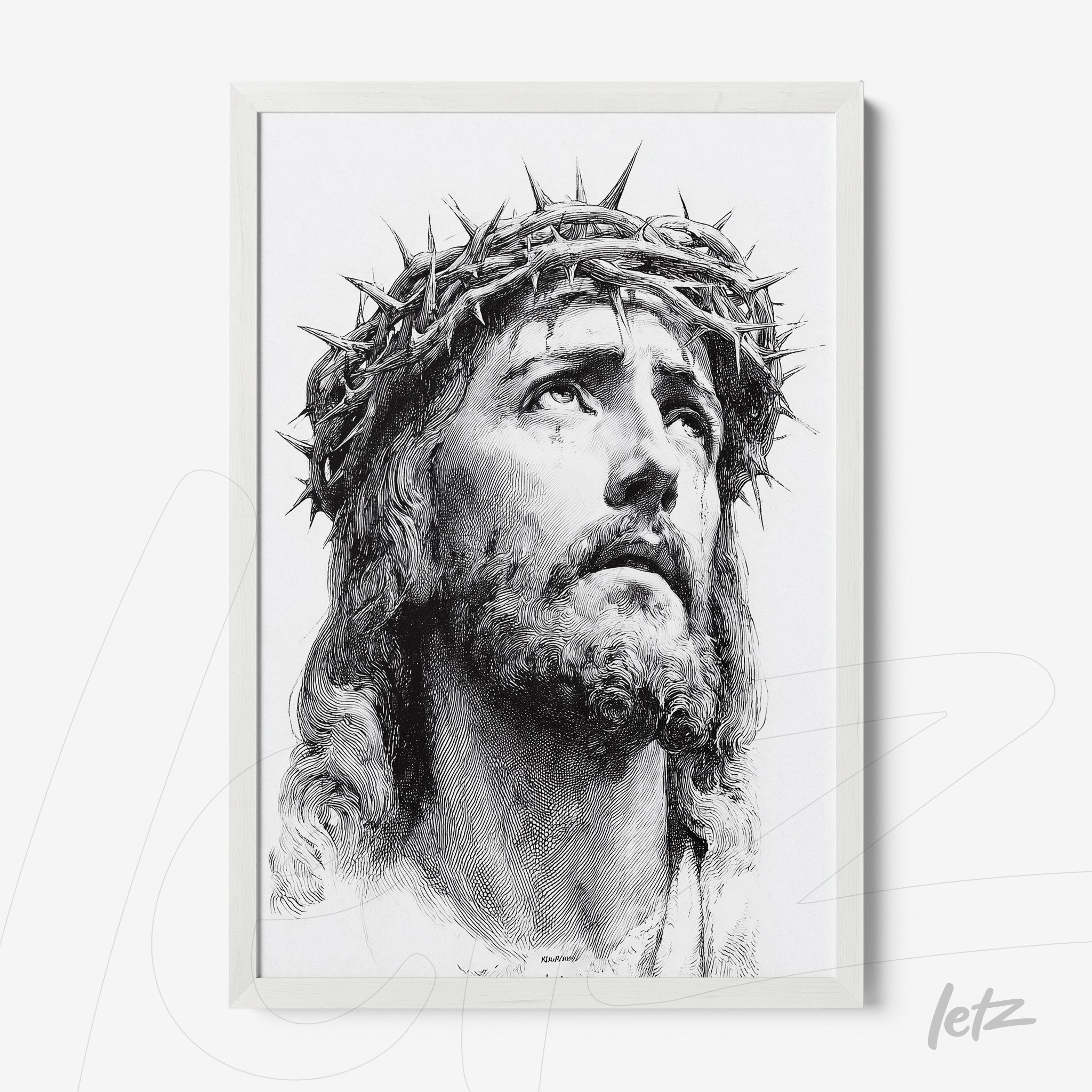 quadro emoldurado em branco com retrato de Jesus Cristo usando coroa de espinhos em tonalidade preta e branca